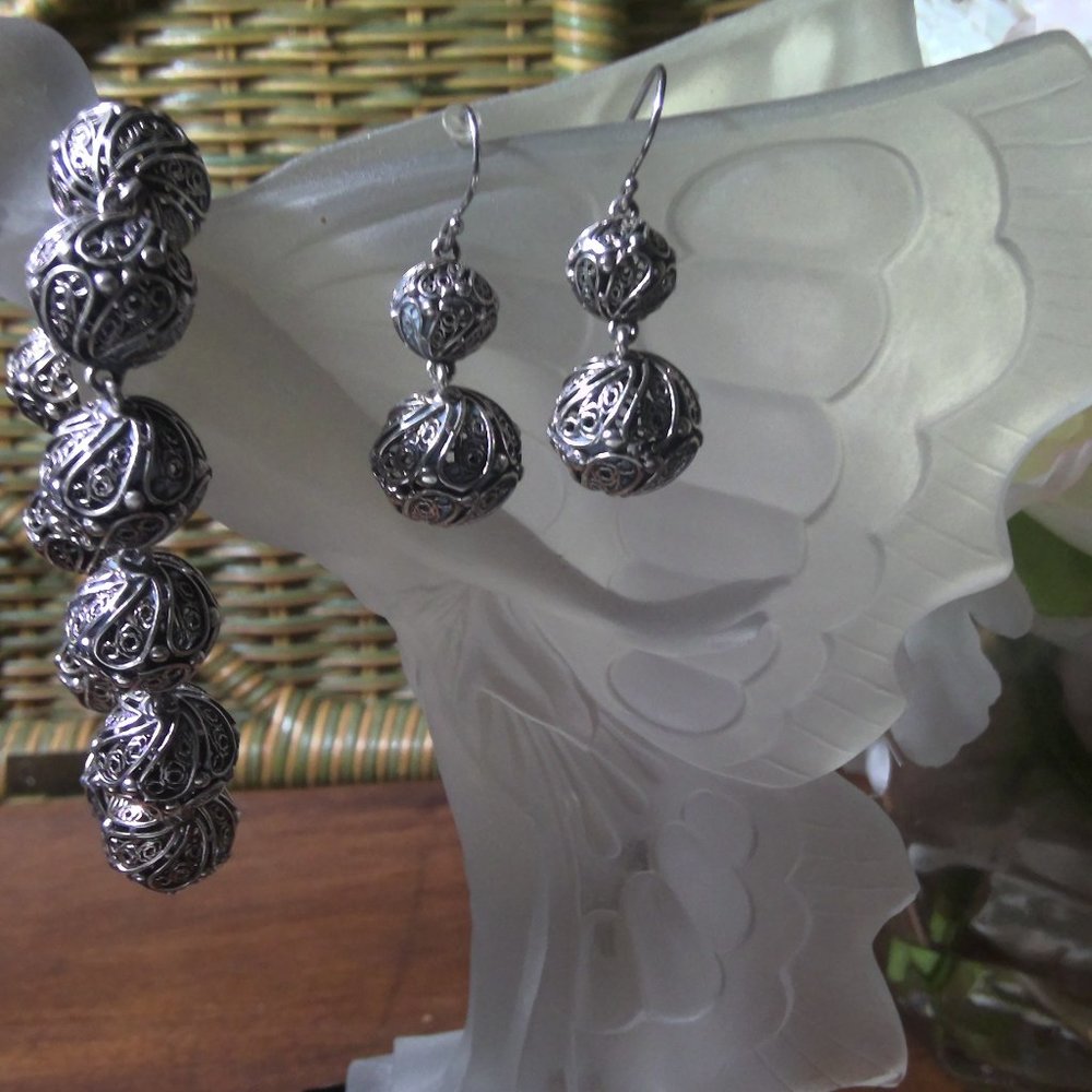 Jewelry set of Silver designer bracelet and earrings